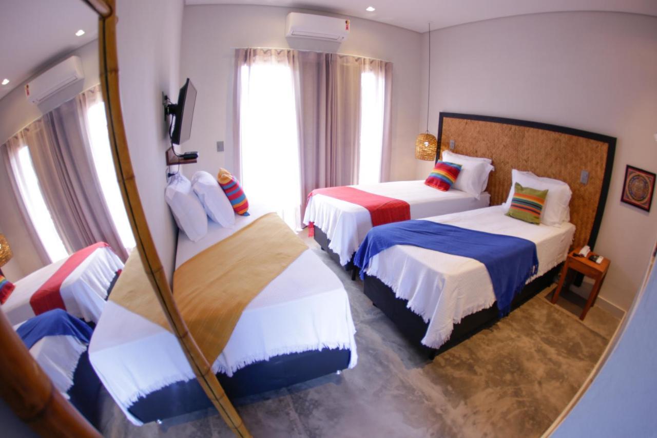 Quarto Triplo com Varanda
